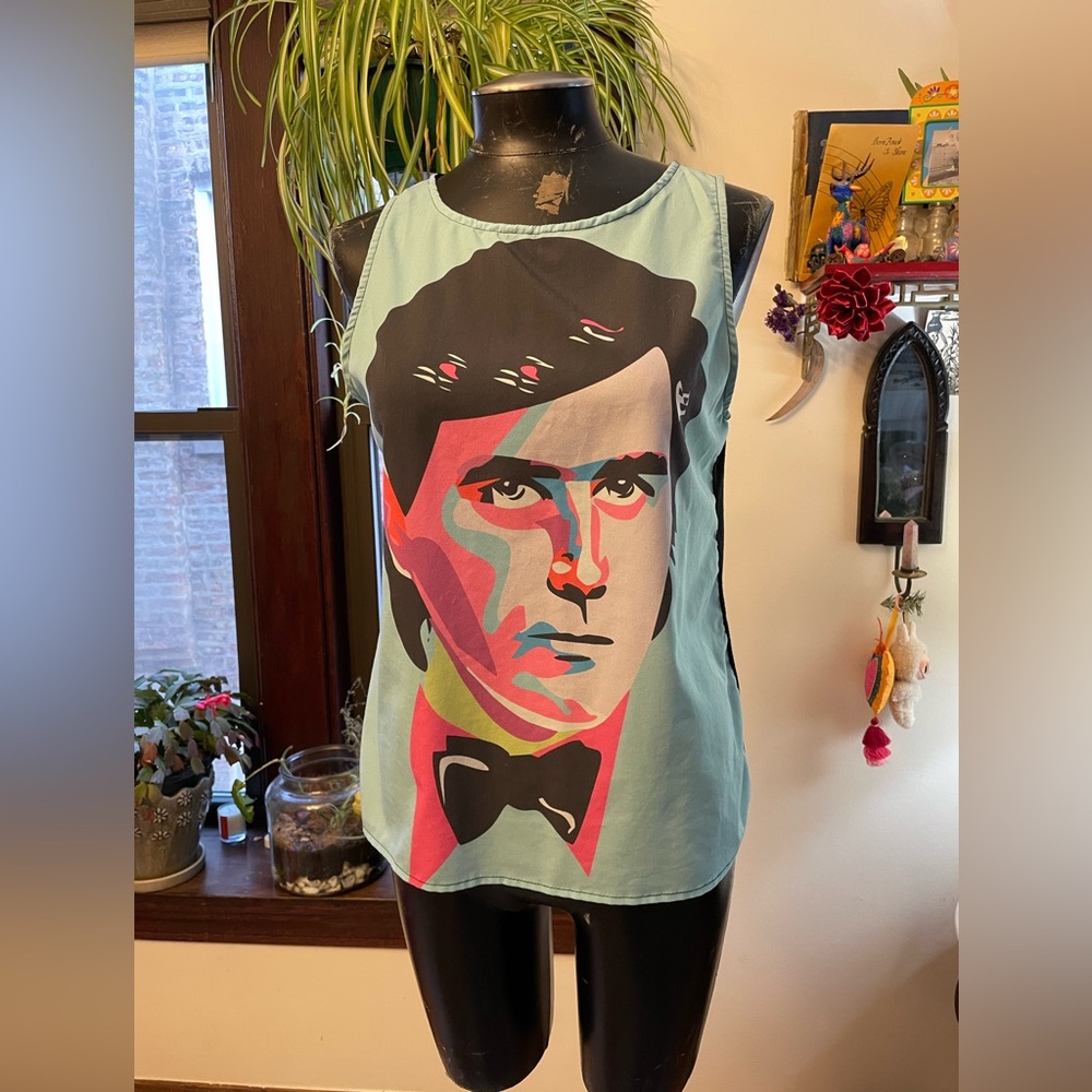 Bryan Ferry face on a flowy sleeveless top!